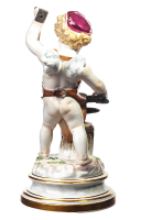 figurine cupid as blacksmith hammering a heart into shape Meissen designed by Heinrich Schwabe Cubids 1st Choice form L 114 1877 hight:19,2cm